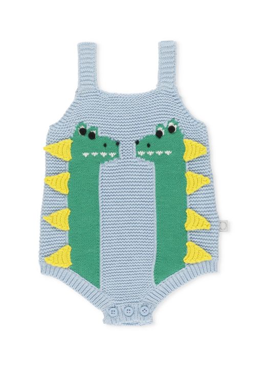 Knitted body with crocodiles