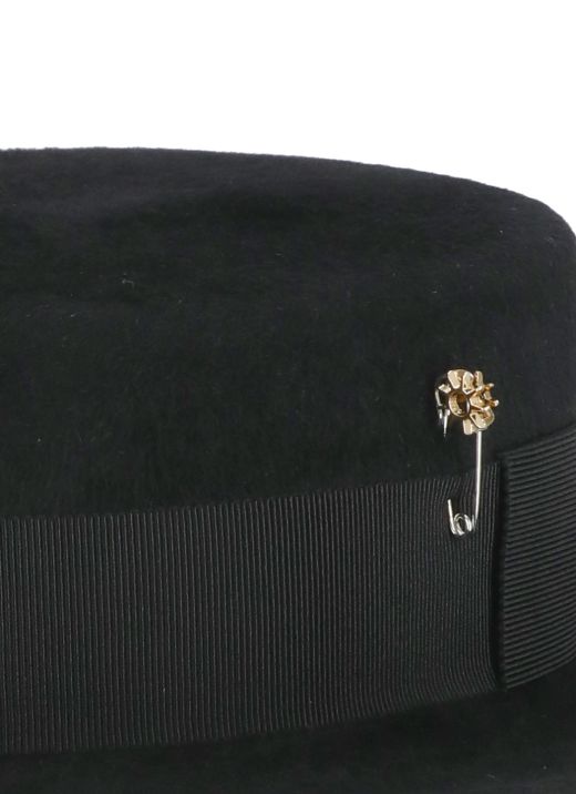 Hat with pin